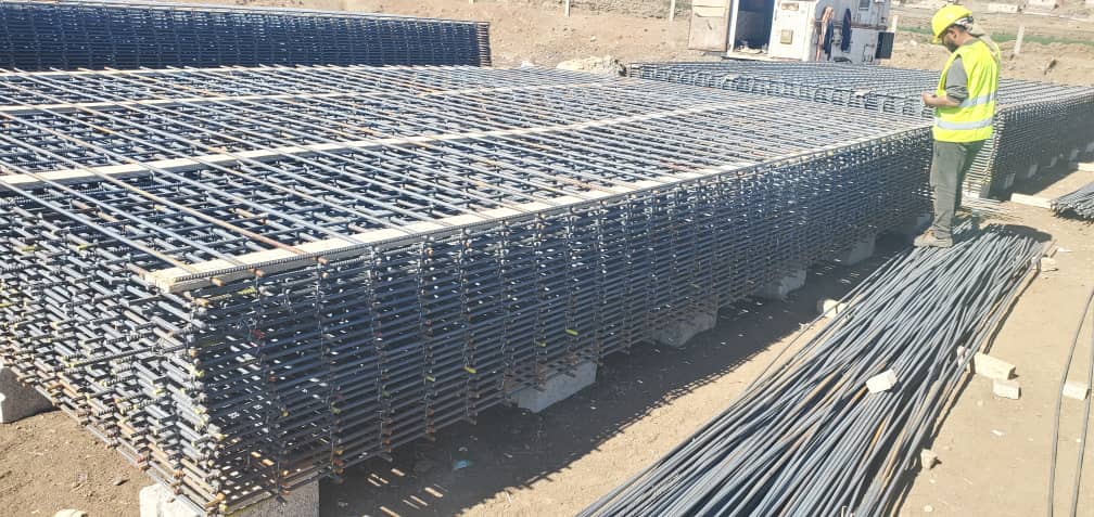 Inspecting and tying rebar to ensure level stability