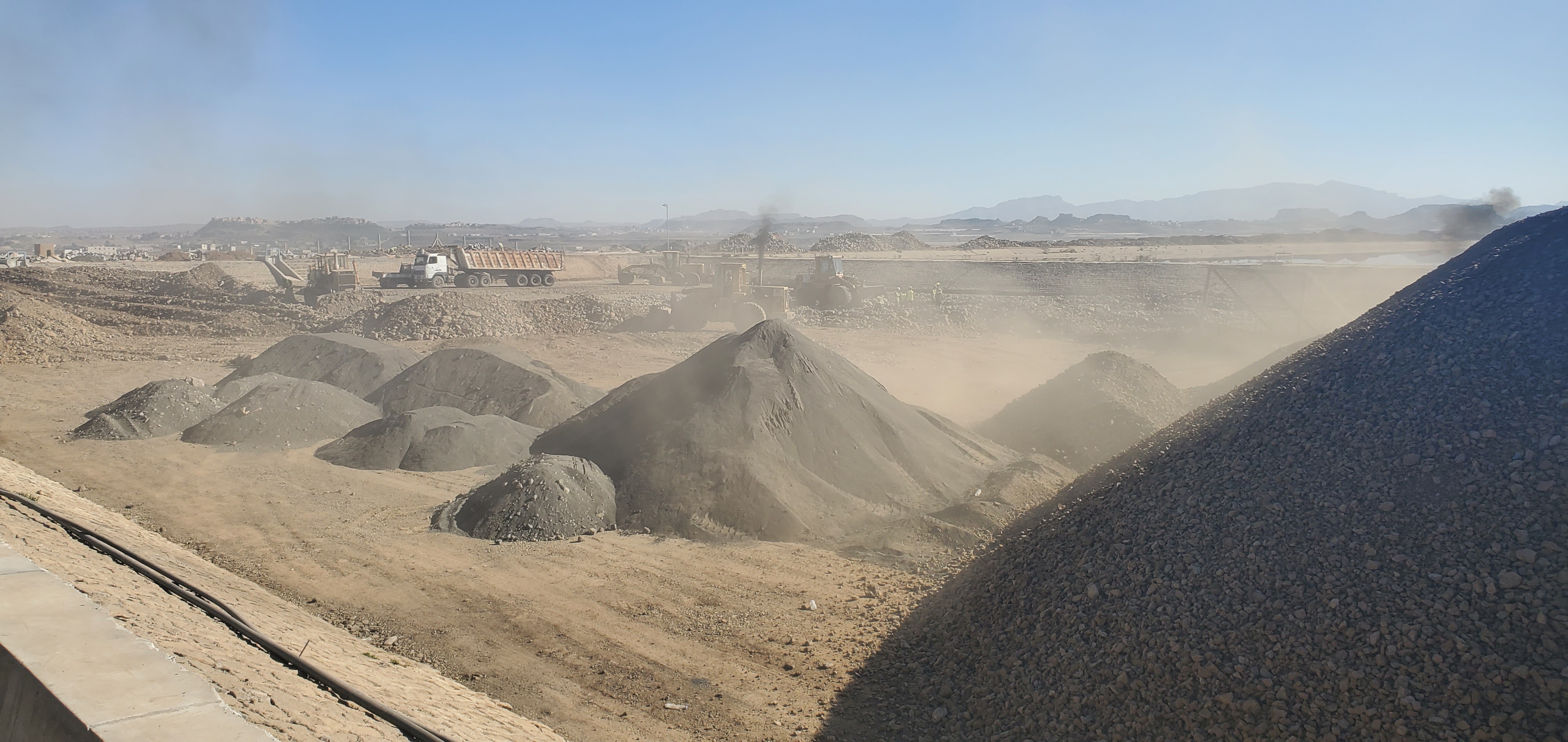 Earth lifting, solid sediment removal, and airborne dust management during excavation