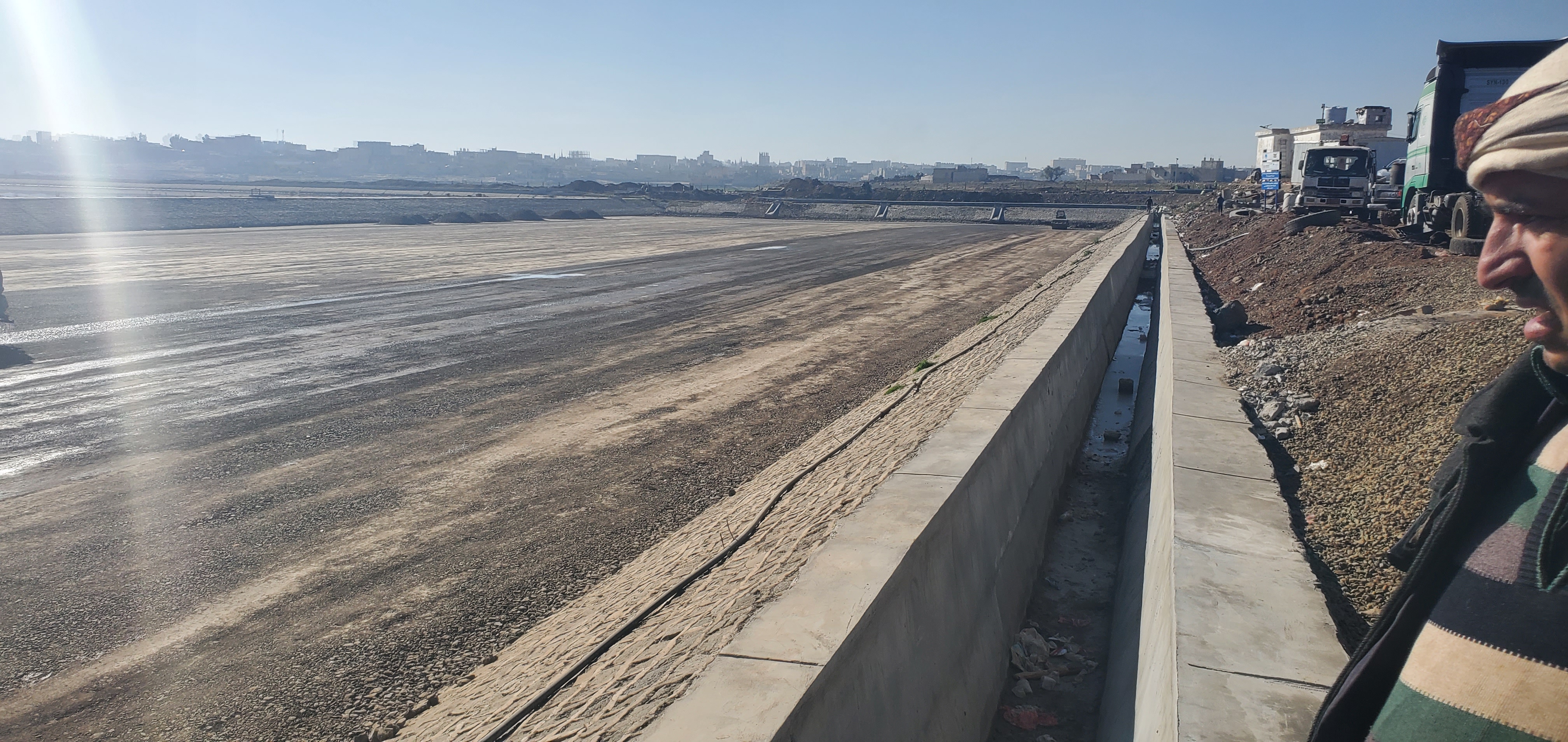 Side concrete channel and earth levelling works for Basin No. 6